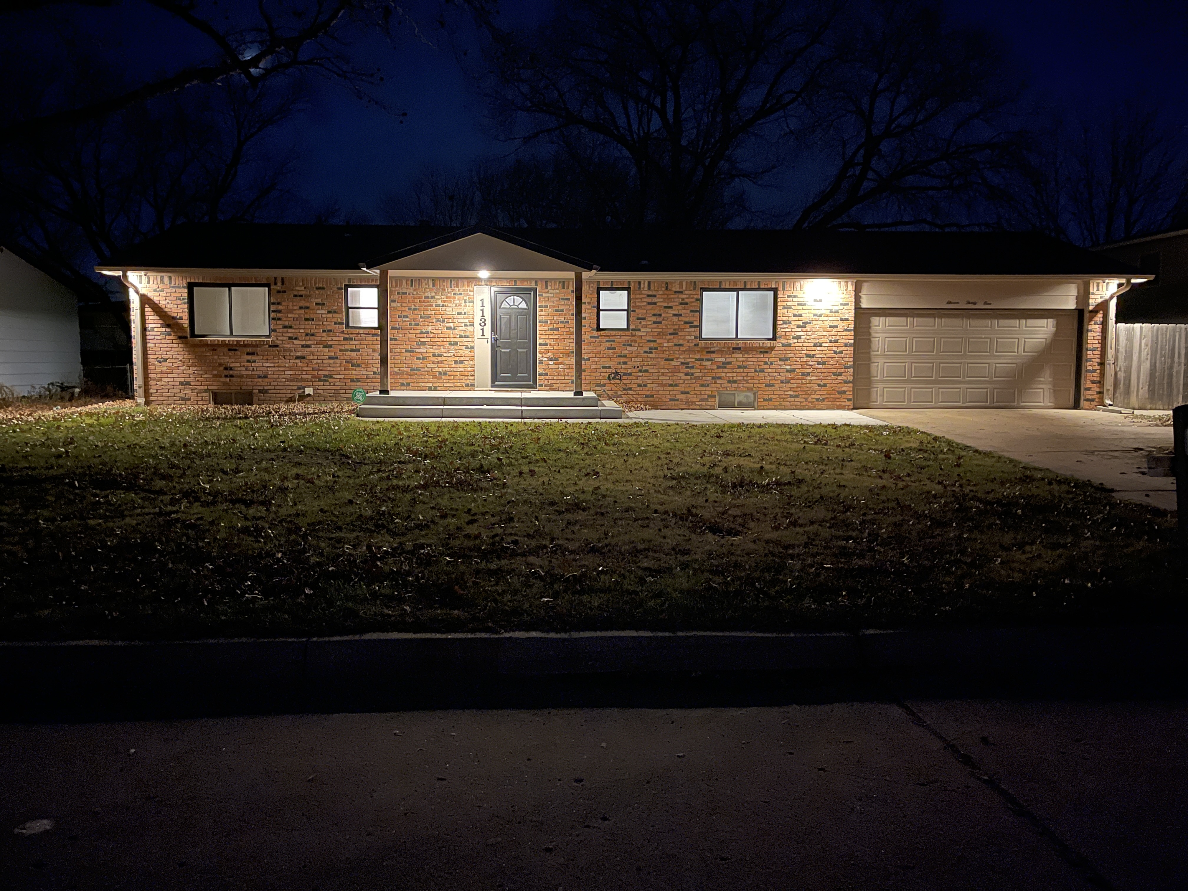 Front of House at Night - New Windows, Porch and Patio Fall 2025